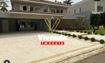 Imagem 2: Exclusivo e recém reformado sobrado de 4 suítes em Alphaville com piscina, churrasqueira