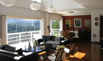 Imagem 2: Casa em condomínio fechado com salão em 3 ambientes com lareira, varanda, 4 suítes, hidro