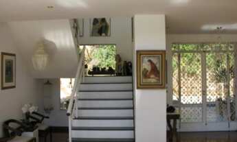 Imagem 5: Casa em condomínio fechado com salão em 3 ambientes com lareira, varanda, 4 suítes, hidro