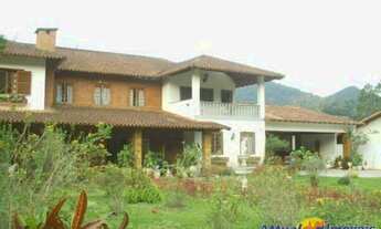 Imagem 2: Casa em condomínio fechado com 4 quartos, sendo 3 suítes