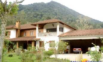 Imagem 3: Casa em condomínio fechado com 4 quartos, sendo 3 suítes