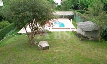 Imagem 6: Casa com 4 suítes, churrasqueira, piscina e 4 vagas de garagem