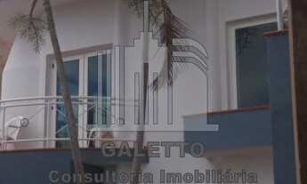 Imagem 2: Espaçosa residência à venda em Campinas-SP, com 3 quartos, 3 suítes, 3 salas e 5 banheiros