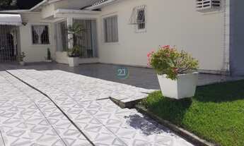 Imagem 2: Vendo Casa com 03 Dormitórios c/ 01 suíte, espaço com churrasqueira a carvão, 03 vagas de