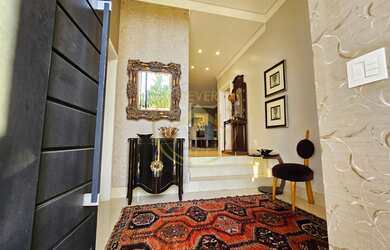 Imagem 6: Casa à venda Alphaville D Pedro em Campinas, sobrado com hall de entrada, lavabo, com 4 Su