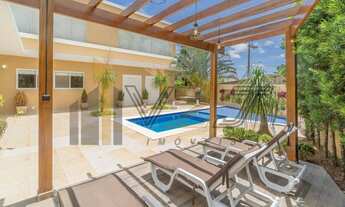 Imagem: Casa principal térrea e área lazer parte