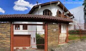 Imagem: Casa com 5 dormitórios, piscina e garagem