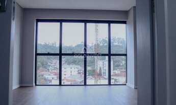 Imagem 3: ![CDATA[APARTAMENTO TERREO 2 SUITES COM UMA AREA EXTERNA DE 50M² E 2 VAGAS DE GARAGEM