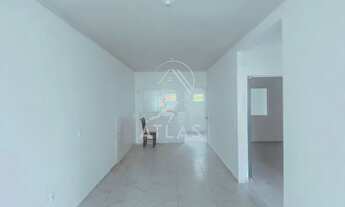 Imagem 2: ![CDATA[CASA BAIXA GEMINADA COM 1 SUÍTE + 1 DORMITÓRIO | PORTO BELO