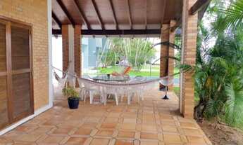 Imagem 2: ![CDATA[Linda casa com 4 suítes para até 11 pessoas a 120m da praia]]