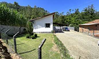 Imagem 2: ![CDATA[CASA COM 3 QUARTOS NO POÇO FUNDO]]