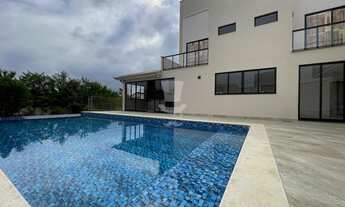 Imagem: Casa à venda com 4 quartos, sendo 4 suítes