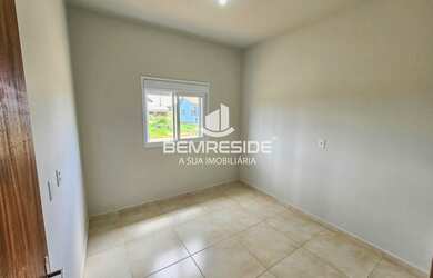 Imagem 6: Casa com suíte e cozinha planejada