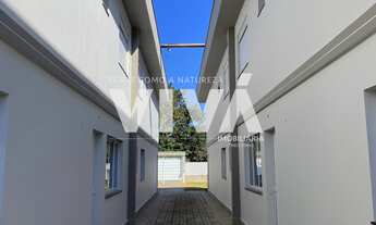 Imagem 4: Casa a venda em Extrema MG, composta por sala. cozinha, lavabo, lavanderia