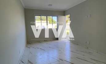 Imagem 6: Casa a venda em Extrema MG, composta por sala. cozinha, lavabo, lavanderia