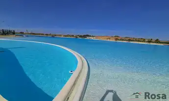 Imagem 3: Apartamento de luxo com lagoa e praia artificial para venda com móveis, próximo ao Colégio