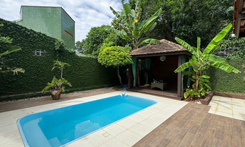 Imagem 7: Casa em condomínio à venda em Balneário Camboriú-SC, no bairro Ariribá, com 4 suítes, 2 va