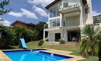 Imagem 2: Casa clean, com ambientes integrados, muito lazer privativo e localizada no Condomínio Par