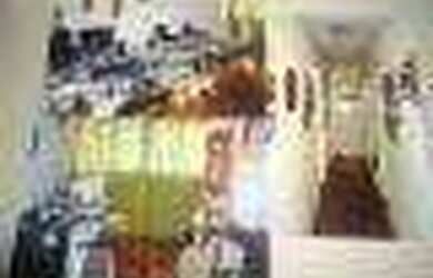 Imagem: A casa possui 5 Dormitórios, 1 Suíte, 3 Vagas na garagem