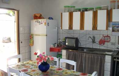 Imagem: A casa possui 5 Dormitórios, 2 Suítes, 2 Banheiros, 2 Vagas