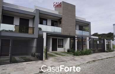 Imagem: A casa possui 3 Dormitórios, 1 Suíte, 3 Banheiros, 2 Vagas