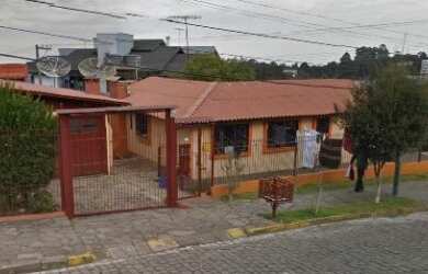 Imagem: A casa possui 3 Dormitórios, 2 Banheiros e está localizado