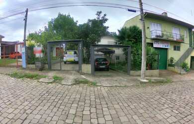Imagem: A casa possui 5 Dormitórios, 1 Suíte, 2 Banheiros, 2 Vagas