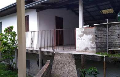 Imagem: A casa possui 2 Dormitórios, 1 Suíte, 1 Banheiro e 1 Vaga