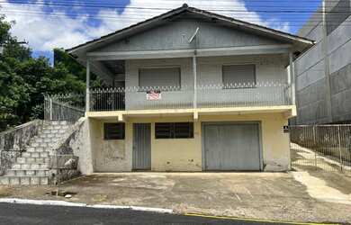 Imagem: A casa possui 3 Dormitórios, 3 Banheiros, 20m² de Área Privada