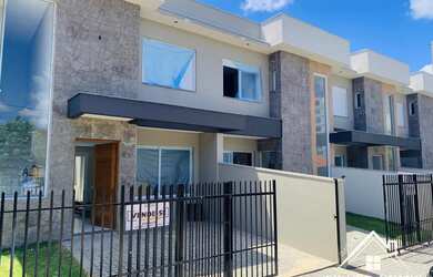 Imagem: A casa possui 3 Dormitórios, 1 Suíte, 2 Banheiros, 2 Vagas