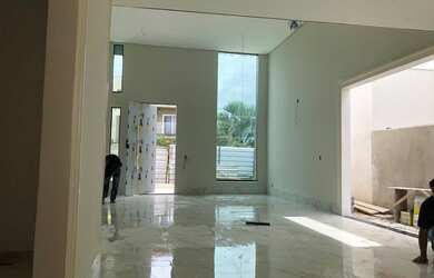 Imagem: A casa em condomínio possui 3 Dormitórios, 3 Suítes, 4 Banheiros