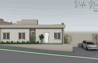 Imagem: A casa possui 3 Dormitórios, 1 Banheiro, 2 Vagas na garagem