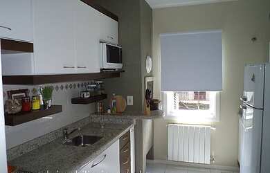 Imagem: O apartamento possui 2 Dormitórios, 1 Suíte, 2 Banheiros