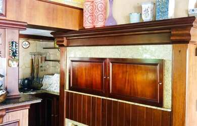 Imagem: A casa possui 6 Dormitórios, 4 Suítes, 1.050m² de Área Privada