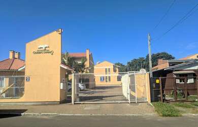 Imagem: A casa possui 2 Dormitórios, 2 Banheiros, 2 Vagas na garagem