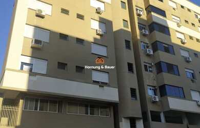 Imagem: O apartamento possui 2 Dormitórios, 1 Suíte, 2 Banheiros