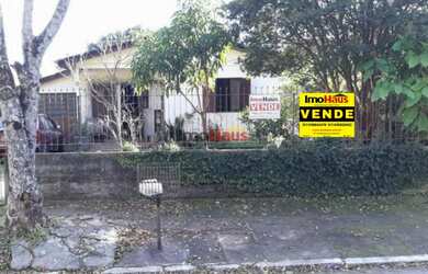 Imagem: A casa possui 2 Dormitórios, 1 Banheiro, 1 Vaga na garagem