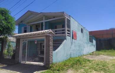 Imagem: A casa possui 4 Dormitórios, 1 Suíte, 2 Banheiros, 3 Vagas