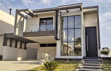 Imagem: A casa em condomínio possui 4 Dormitórios, 4 Suítes, 5 Banheiros