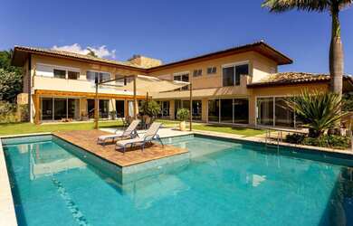 Imagem: A casa em condomínio possui 4 Dormitórios, 4 Suítes, 4 Banheiros