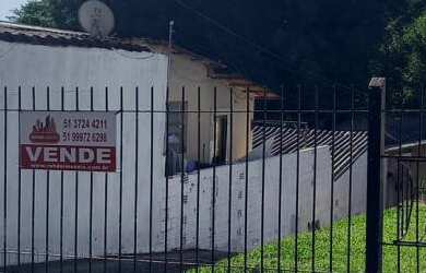 Imagem: A casa possui 3 Dormitórios, 1 Suíte, 2 Banheiros, 20m² de