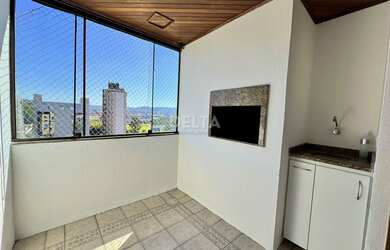 Imagem: O apartamento possui 2 Dormitórios, 1 Suíte, 2 Banheiros