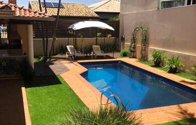 Imagem: A casa em condomínio possui 5 Dormitórios, 4 Suítes, 5 Banheiros