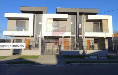 Imagem: A casa possui 3 Dormitórios, 1 Suíte, 2 Banheiros, 2 Vagas