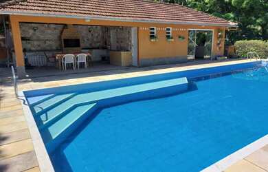 Imagem: A chácara possui 7 Dormitórios, 4 Suítes, 2 Banheiros, 140.000m²