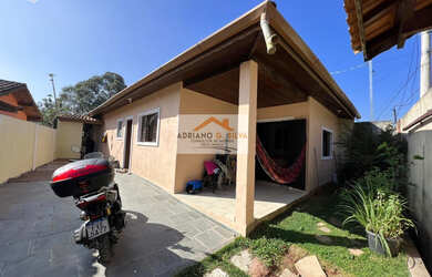 Imagem: A casa possui 3 Dormitórios, 1 Suíte, 2 Banheiros, 2 Vagas