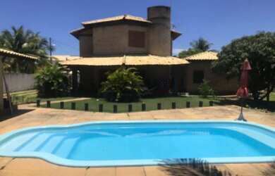 Imagem: A casa em condomínio possui 4 Dormitórios, 4 Suítes, 5 Banheiros