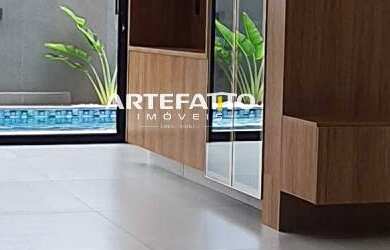 Imagem: A casa em condomínio possui 4 Dormitórios, 4 Suítes, 5 Banheiros