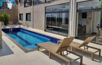 Imagem: A casa possui 4 Dormitórios, 4 Suítes, 5 Banheiros, 4 Vagas