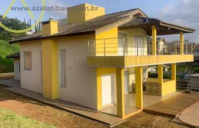 Imagem: A casa possui 4 Dormitórios, 3 Suítes, 4 Banheiros, 3 Vagas